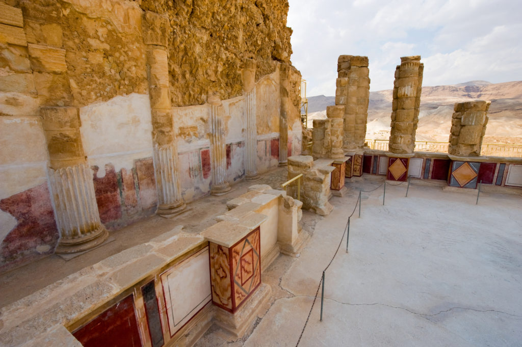 Pilasters and columns, plastered and painted with frescos at the lower terrace of the palace of king Herod on the rock masada
